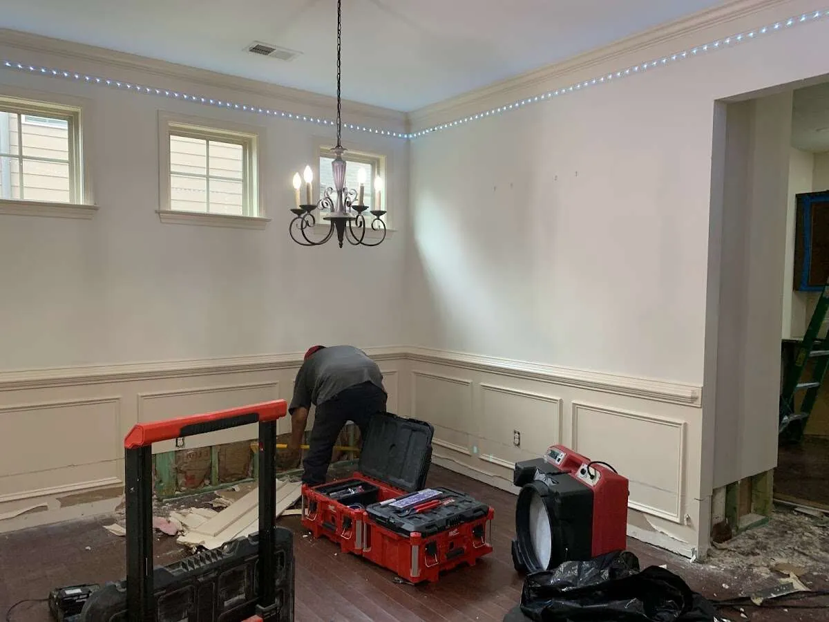 Restoration technician with professional equipment in New Hyde Park